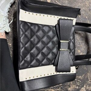 Chic Quilted Black and White Tote Bag with Bow Accent